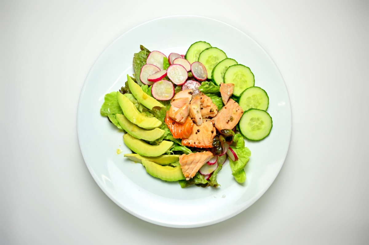 A nutritious and balanced meal featuring salmon and fresh vegetables for healthy eating