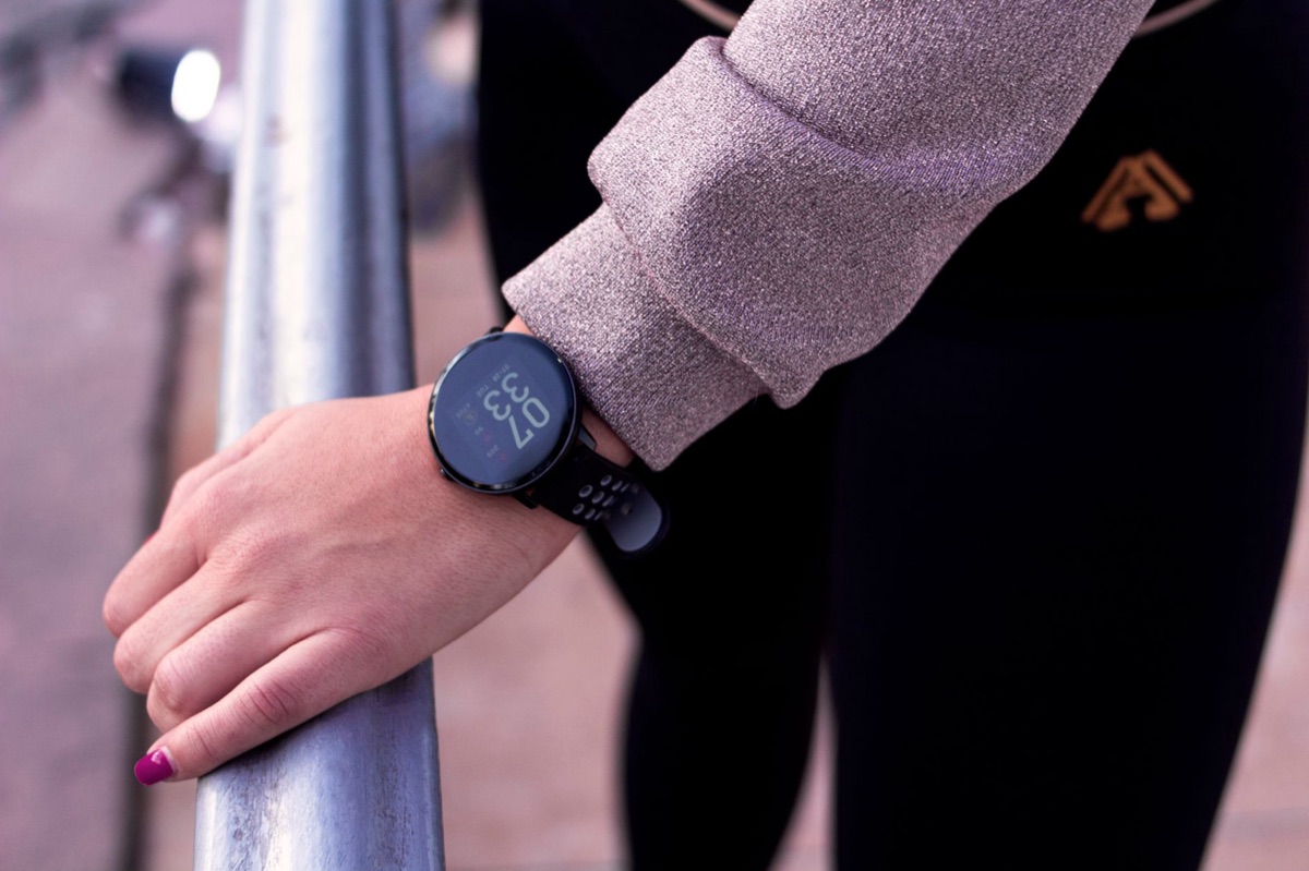 A smartwatch showing health metrics to track fasting and wellness routines