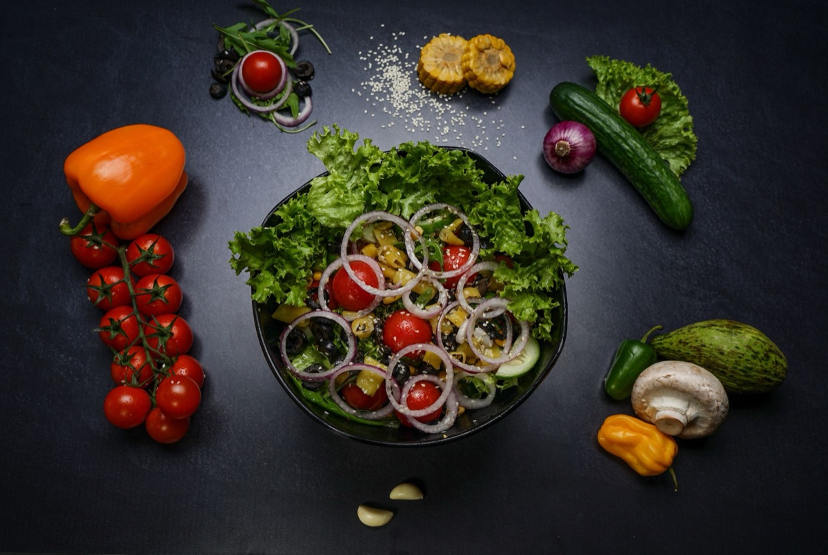 salad bowl with mixed greens and cherry tomatoes