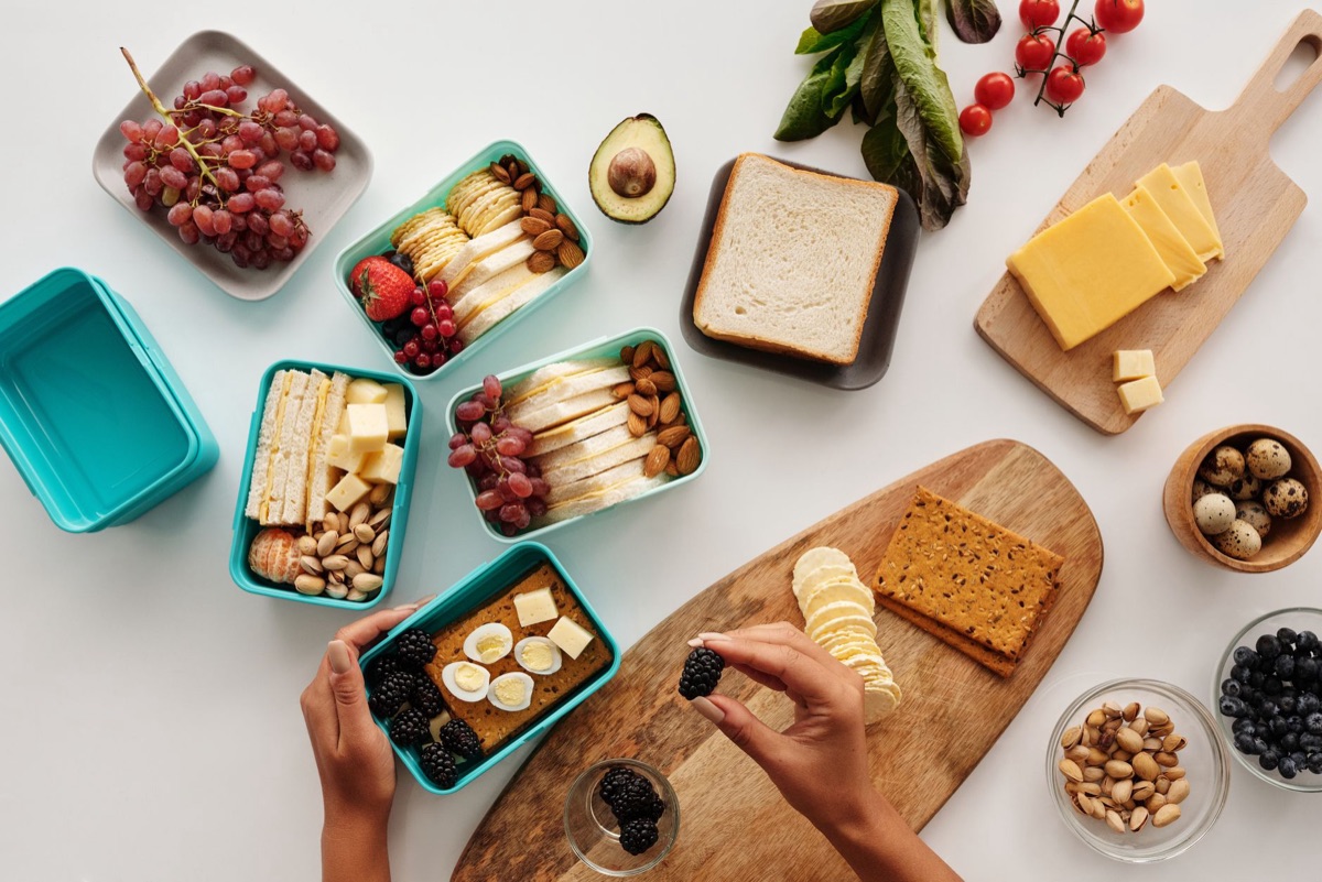 healthy snack container with fruits and nuts